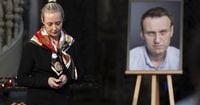 Alexei Navalny's widow says lab reports show her husband was poisoned