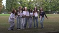 Top GCSE grades rise but key pass rate falls