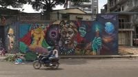 Graffiti finds acceptance in Conakry, inspired by Senegal’s street art tradition