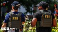 FBI fires agents pictured kneeling at George Floyd protest, US media report