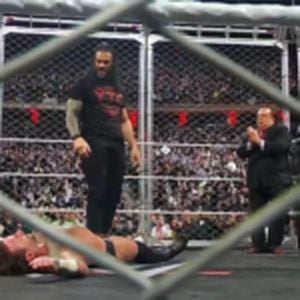 CM Punk And Seth Rollins Face Off In WWE Raw Cage Match