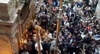 Благодатный огонь сошёл в храме Гроба Господня в Иерусалиме