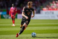 Kane scores 60th Bundesliga goal as Bayern beats Heidenheim to close in on the title