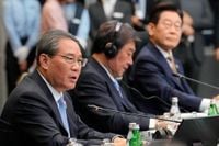 China and ASEAN, hit by U.S. tariffs, sign upgraded free trade pact