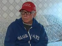 Blue Jays fan booted for wearing 'Canada is not for sale' hat as team admits 'staff made a mistake'