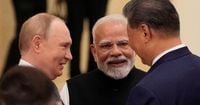 China's Xi pushes a new global order, flanked by leaders of Russia and India