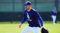 Why is Freddie Freeman not playing in Dodgers' season opener?