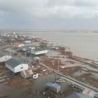 Officials airlift evacuees to safety after the remnants of Typhoon Halong devastate Alaska villages