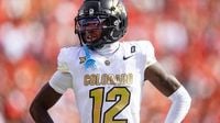 Travis Hunter says if forced to play one position in NFL he'd 'never play football again'