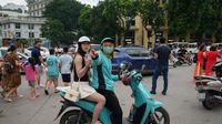 Vietnam’s love affair with gas bikes is colliding with a new electric reality - The Livingston Enterprise