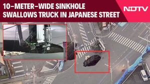 Rescue Operations Intensify For Driver Trapped In Tokyo Sinkhole