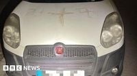 Man held after cars in German city found smeared with swastikas in blood