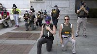 FBI agents seen kneeling in infamous protest picture learn their fate