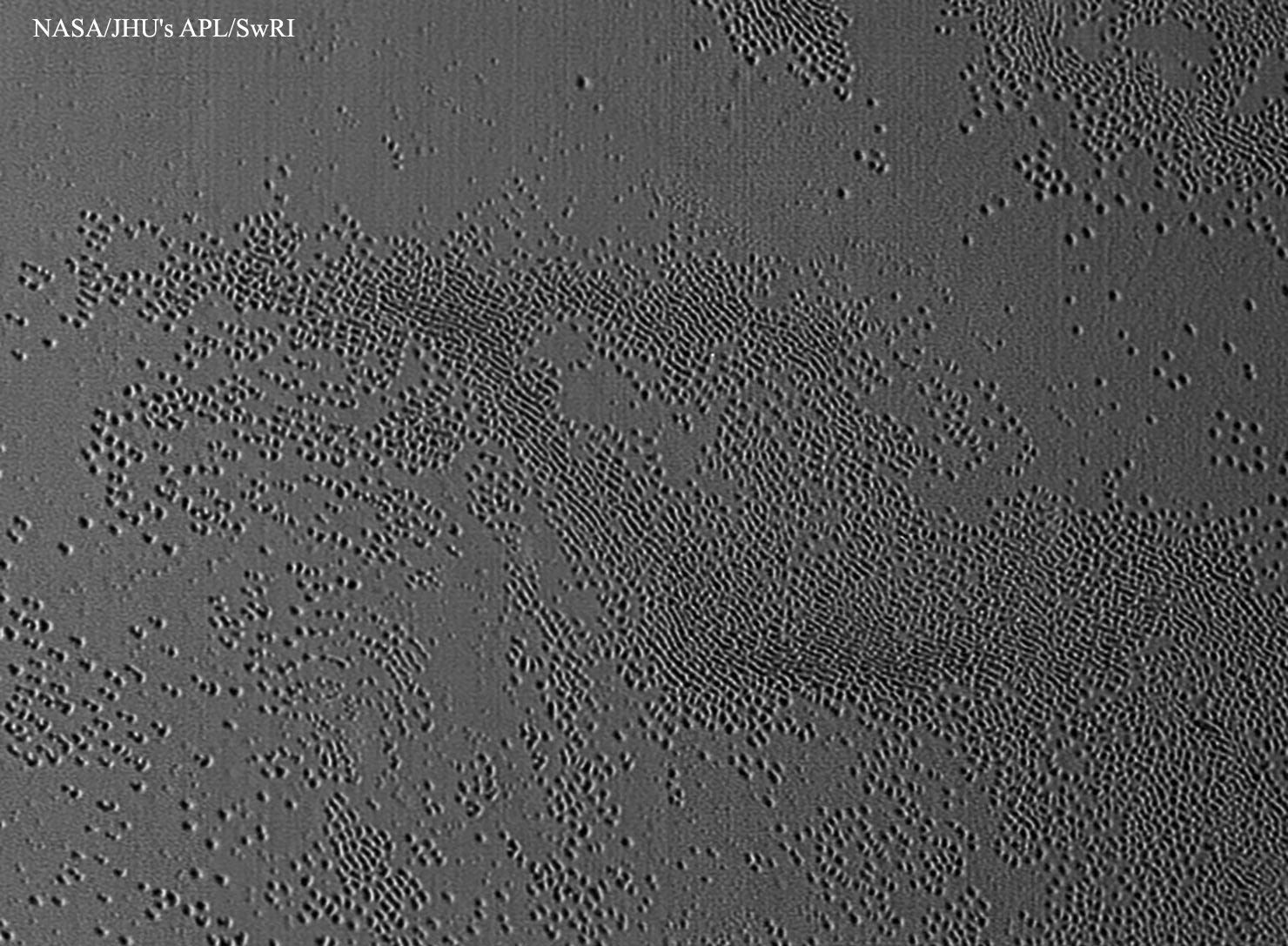  Unusual Pits Discovered on Pluto 