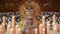 Las imágenes del Viernes Santo: La Macarena inaugura el reencuentro de Sevilla con su Madrugá