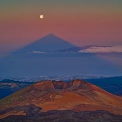 A Triangular Shadow of a Large Volcano