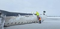 Approach Speed Focus of Accident Probe Into Overturned CRJ-900 in Toronto