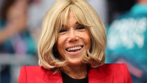 Brigitte Macron Shines At Pièces Jaunes Event