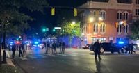 Gunmen kill two, injure 12 in a shootout in a crowd in Alabama capital's downtown