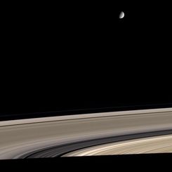 Saturn: Dirty Rings and a Clean Moon