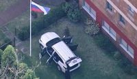 Man arrested after SUV crashes into Russian consulate gates in Sydney