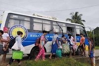 Tens of thousands of people evacuate to safety as typhoon approaches eastern Philippines