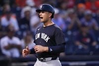 Yankees tell J.C. Escarra he has made the team with fun hidden camera video