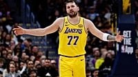 Luka Doncic injury update: Lakers star guard heads to locker room after falling off elevated court