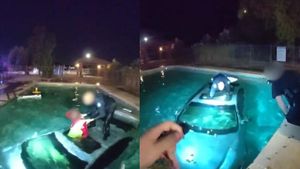 Police Rescue Man From Submerged Car At Pool