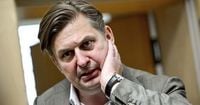 German parliament lifts immunity of a prominent far-right lawmaker and police search his home