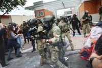 Trump’s Immigration Forces Deploy “Less Lethal” Weapons in Dangerous Ways, Skirting Rules and Maiming Protesters