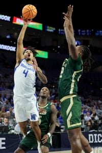 PJ Haggerty, Dain Dainja and No. 16 Memphis win AAC tourney with a 84-72 win over UAB