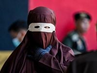 Public caning for homosexuality? Indonesian men receive 80 lashes for hugging and kissing