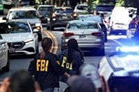 ‘Militarization of politics’: How bucolic Bethesda woke up to FBI search on John Bolton - WTOP News