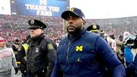 Fired Michigan coach Sherrone Moore accused of stalking victim 'for months' in police dispatch audio