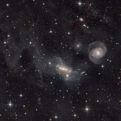 Bütünleşmiş Değişen Bulutsular ve NGC 7771 Grubu