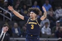 Michigan beats Wisconsin in Big Ten Chamionship Game in Indy - Indianapolis Recorder