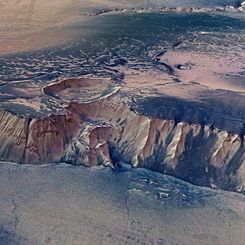 High Cliffs Surrounding Echus Chasma on Mars