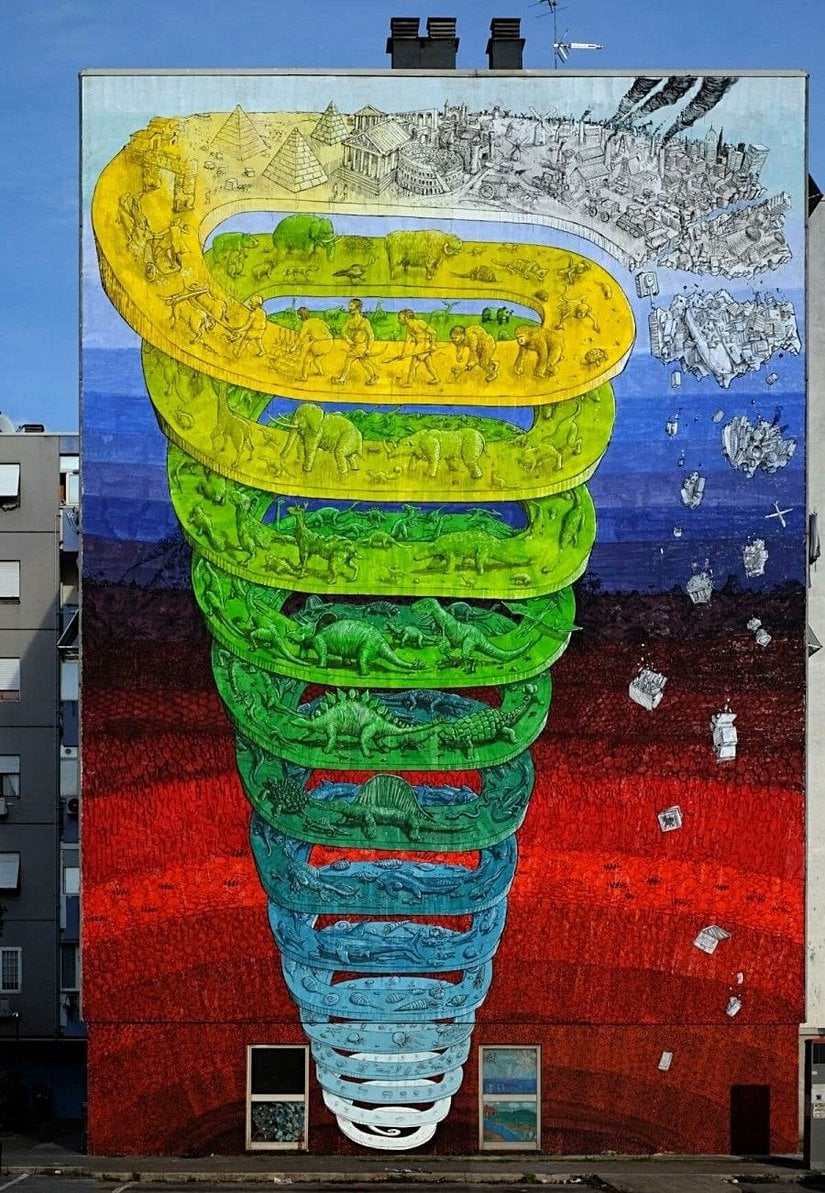 Bir bina üzerine yapılan bu harika duvar çiziminde, evrim tarihine kısa bir bakış atılıyor. Tabii ki, sanatın sivri ve kıvrak zekası kullanılarak günümüze gönderme yapılmaktan çekinilmiyor.