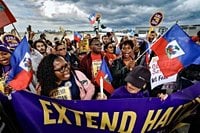 Judge Denies Trump Bid to End Protected Status for Haitians as ICE Fears Loom