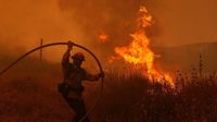 Fast-growing brush fire forces thousands to evacuate north of Los Angeles