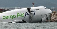 Emirates Cargo Plane Slides Off Hong Kong Runway, Killing 2 Ground Crew