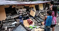 Rescuers desperately search for survivors of earthquake in the Philippines that killed at least 72