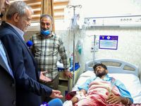 Iran’s President Pezeshkian visits injured, site of deadly port explosion