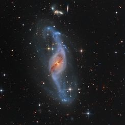  Twisting with NGC 3718 