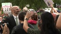 Video shows crowds cheering as CDC officials who resigned walk out of building | CNN