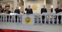 North Korea displays new long-range missile at a military parade celebrating Kim Jong Un