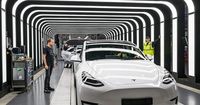 Tesla stock drops after a report says its low-cost vehicle will be delayed to 2026