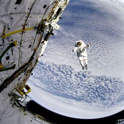 A Flying Astronaut Over Earth