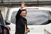 Thailand's former Prime Minister Thaksin makes surprise departure ahead of a risky court ruling